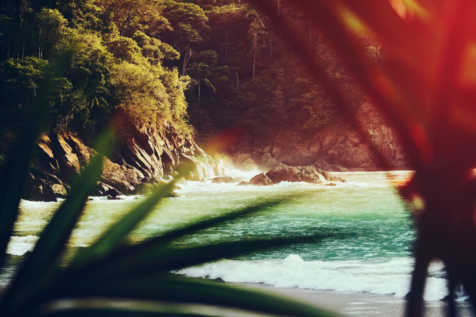 Rugged Pacific coastline near Jacó, Costa Rica with jungle waterfall and turquoise ocean water